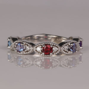 five gemstone mothers ring with diamonds