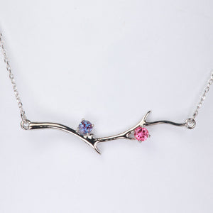 white gold mothers branch pendant with two gemstones