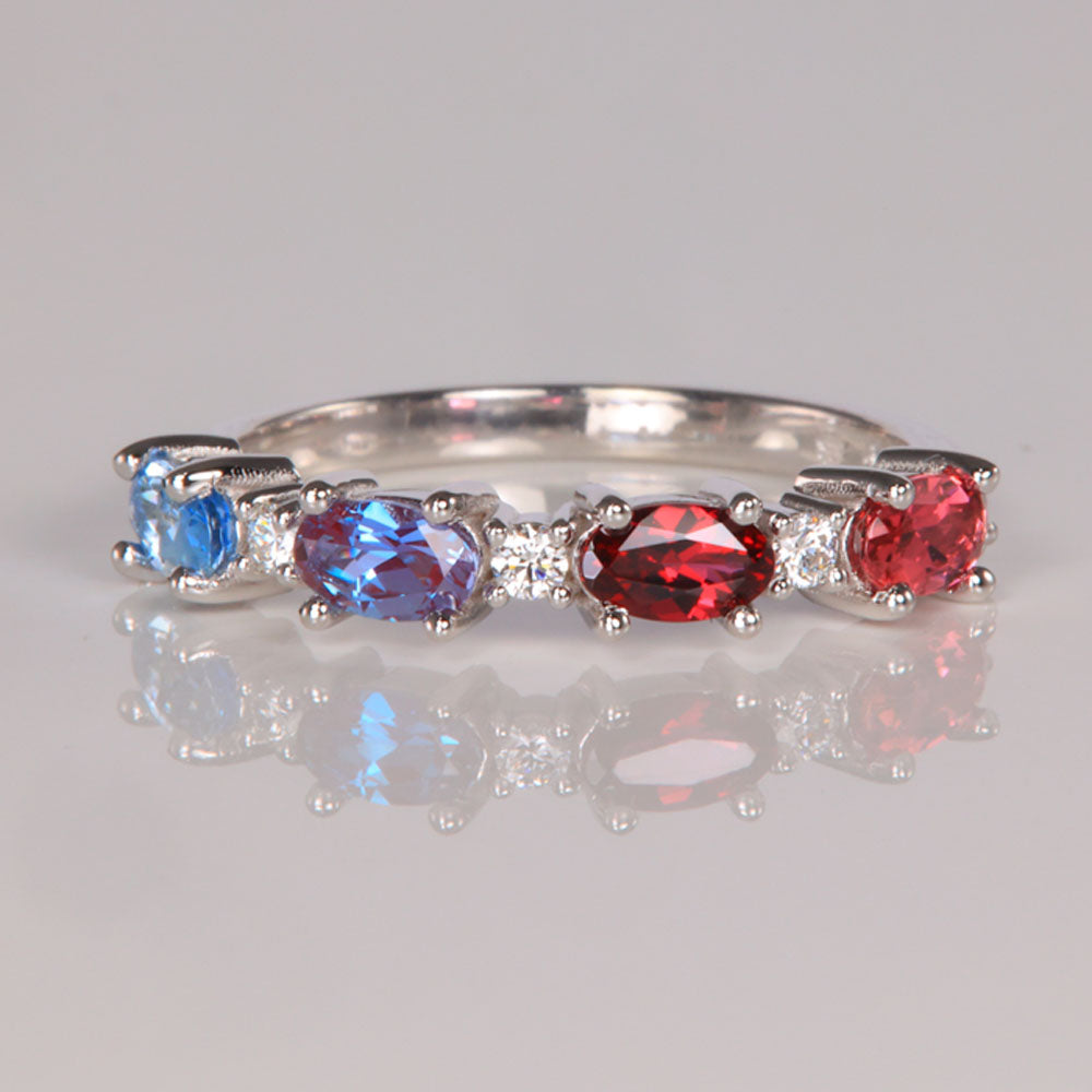 white gold oval east west birthstone ring with diamonds