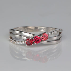 white gold three birthstone mother's ring with diamonds