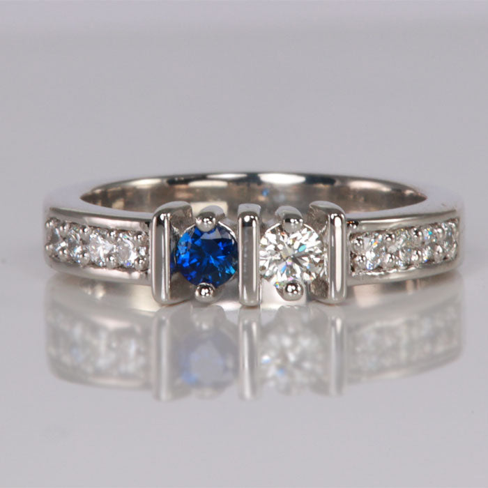 round cut birthstone ring with diamonds in white gold