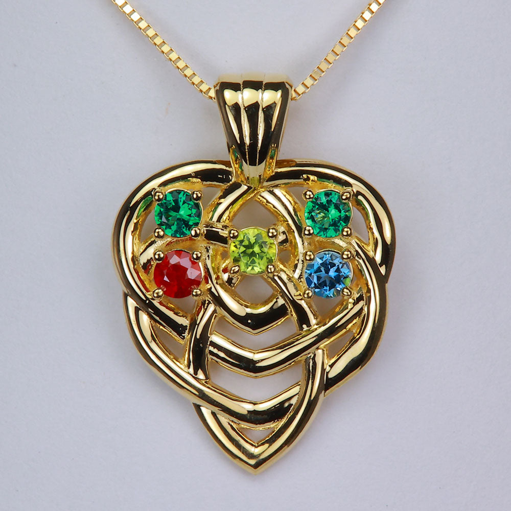 yellow gold mothers celtic pendant with five gemstones
