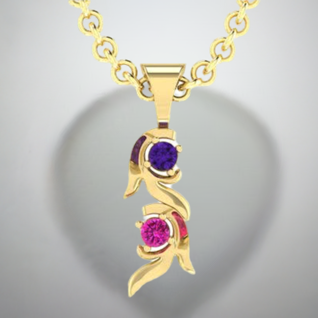 A gold pendant featuring a vine design with two natural gemstones, displayed against a reflective background.
