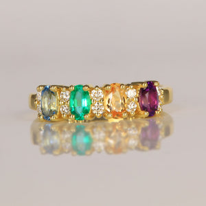 four stone oval cut mothers ring with diamonds