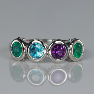 four stone bezel set mothers ring with diamonds