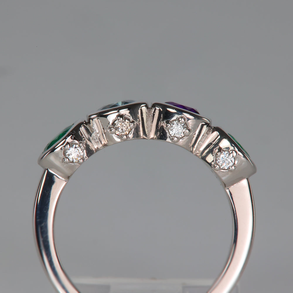 mothers ring with diamonds and four gemstones