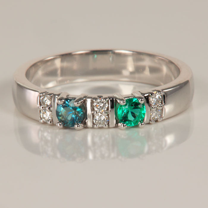 two larger stone mothers ring with diamonds white gold