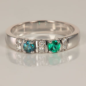 two larger stone mothers ring with diamonds white gold