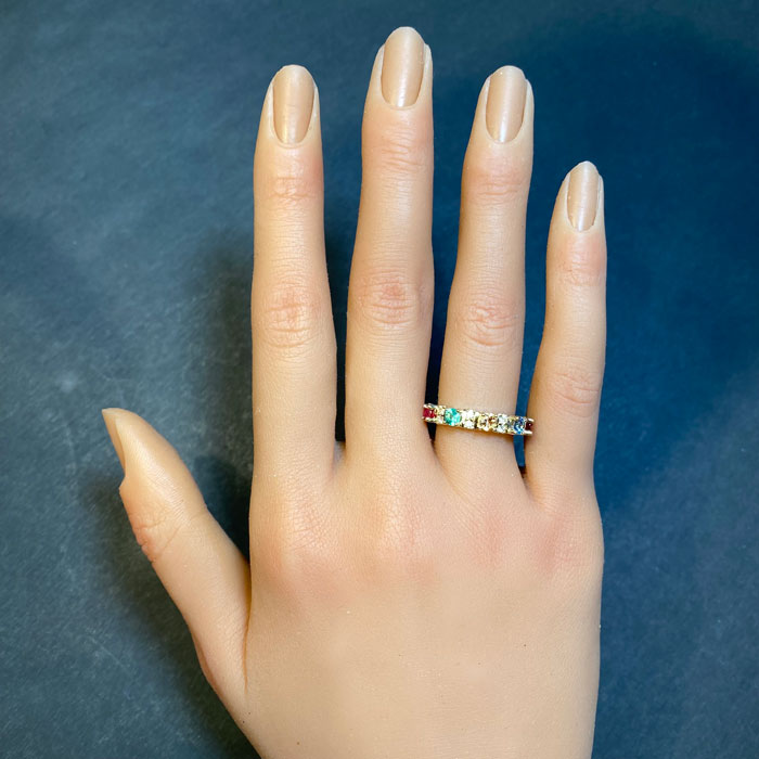 mothers ring with six gemstones on hand