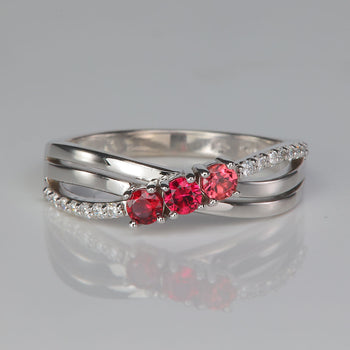 white gold three birthstone mother's ring with diamonds
