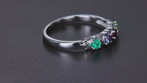 Uniquely detailed 4 stone mothers ring