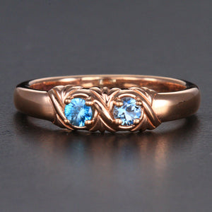 Uniquely detailed 2 stone mothers ring