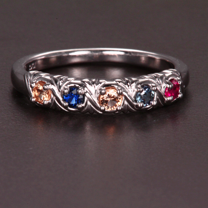 Uniquely detailed 5 stone mothers ring