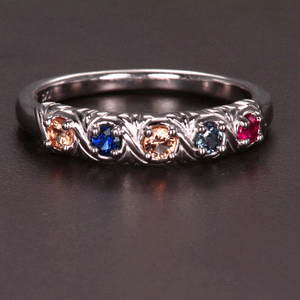 Uniquely detailed 5 stone mothers ring