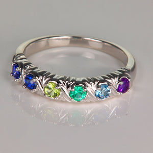Uniquely detailed 6 stone mothers ring