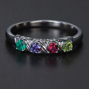 Uniquely detailed 4 stone mothers ring